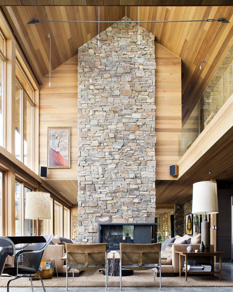 Two-Story Fireplace in a Vaulted Farmhouse Interior