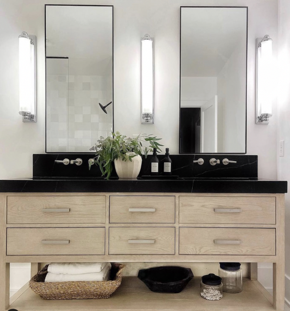Vanity in Light Wood with a Black Countertop