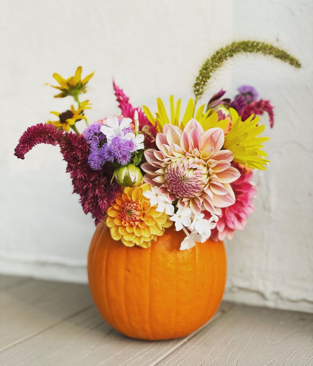 Colorful Blooms Pumpkin Floral Arrangement