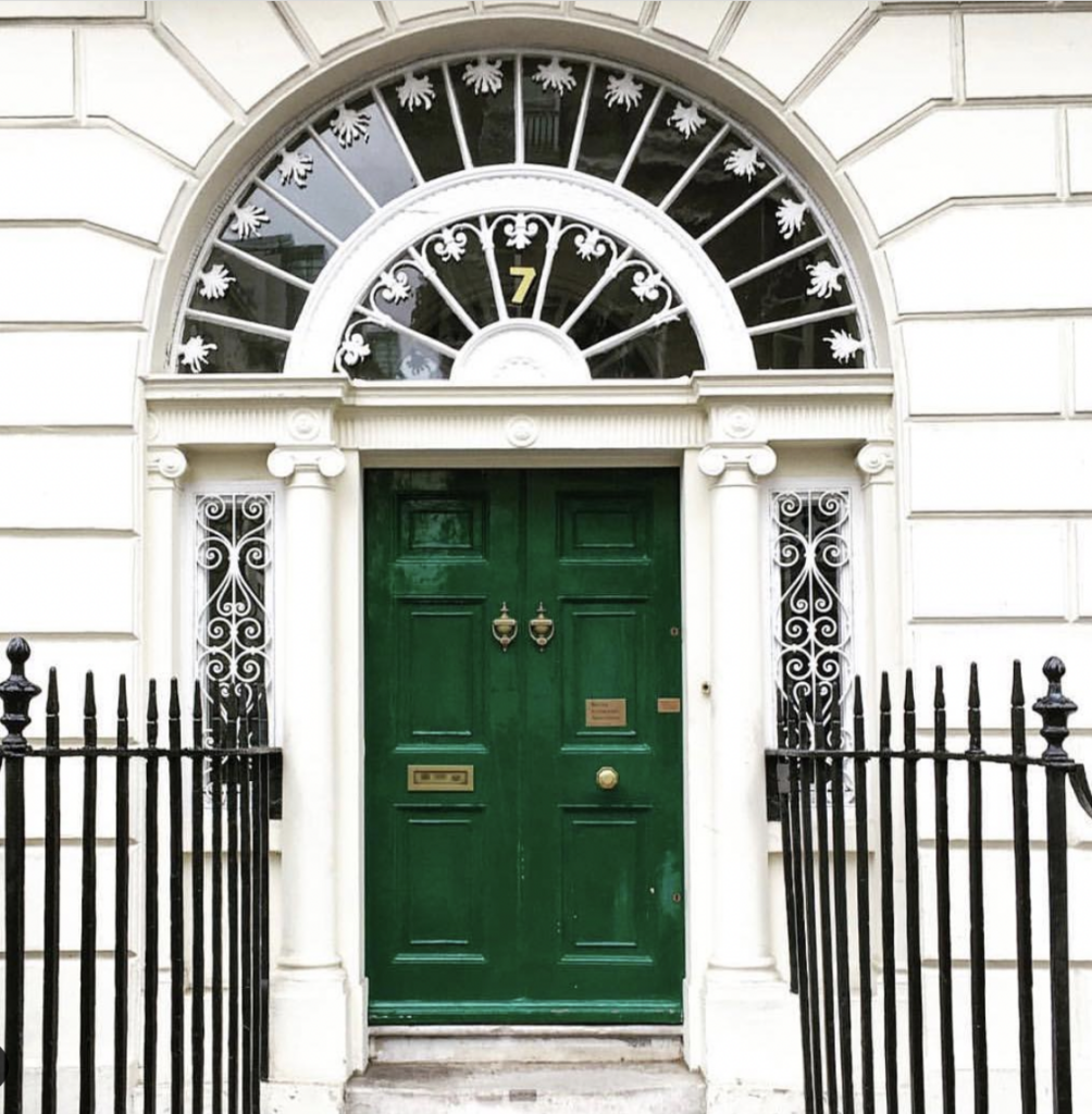 Victorian Style Home with a Dark Green Door