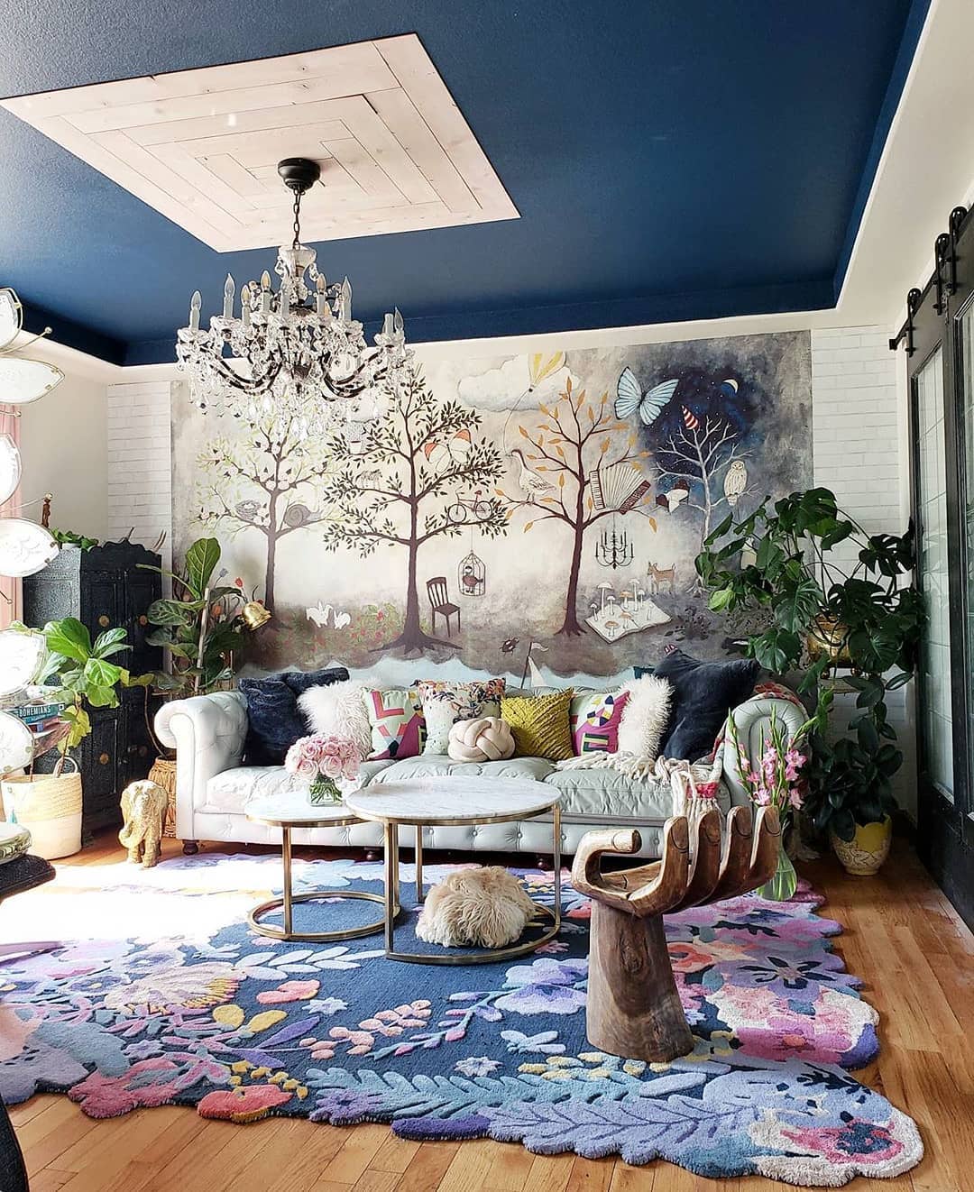 Whimsical Art and Bold Accents in an Eclectic Living Room
