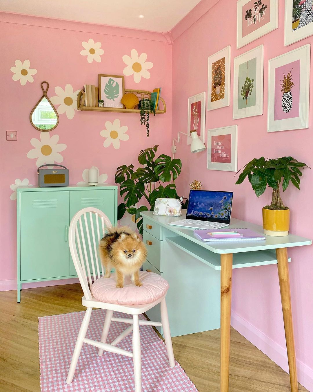 Whimsical floral art in a pink office