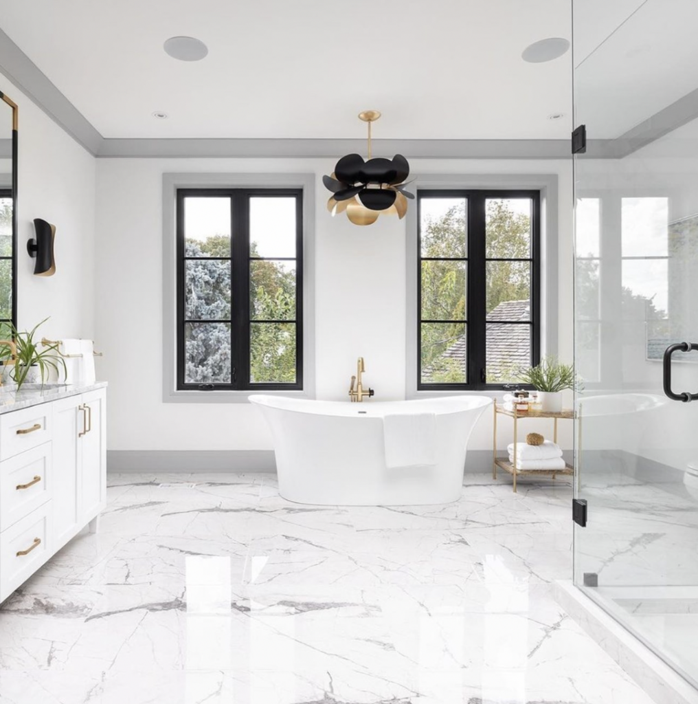 White Bathroom and Black Gold Chandelier