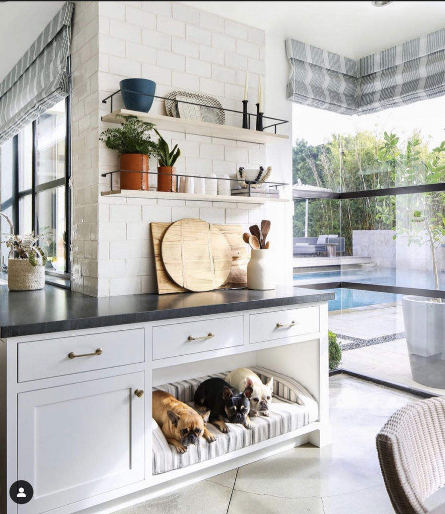 White Cabinets Dark Countertop and Floating Wood Shelf