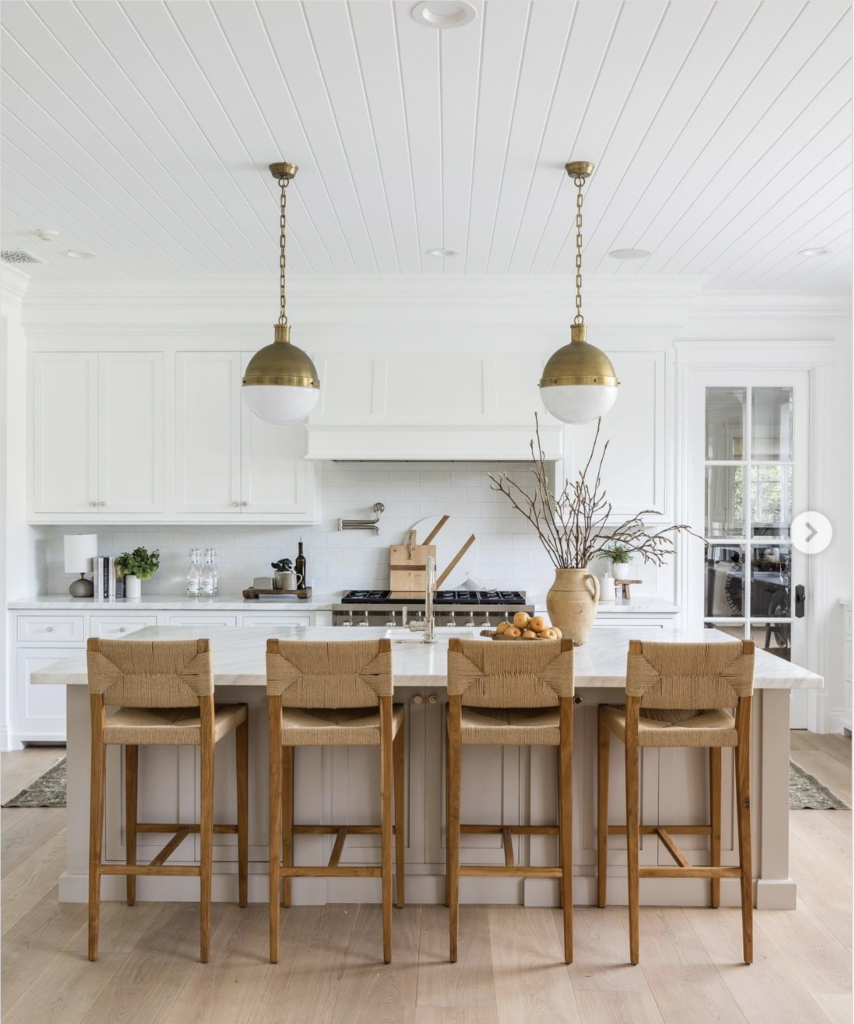 White Cabinets with Gold Pendants