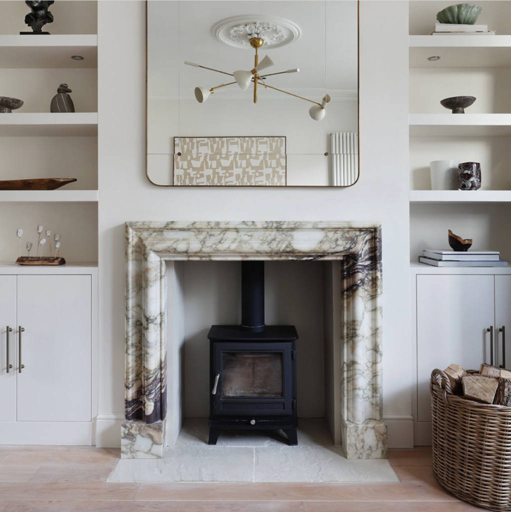 White Fireplace with Built-In Shelving