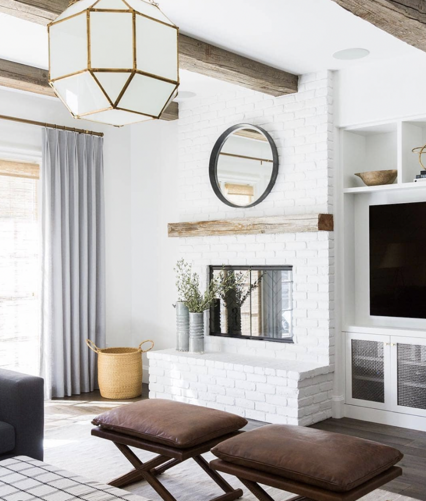 White Fireplace with Wood Beam