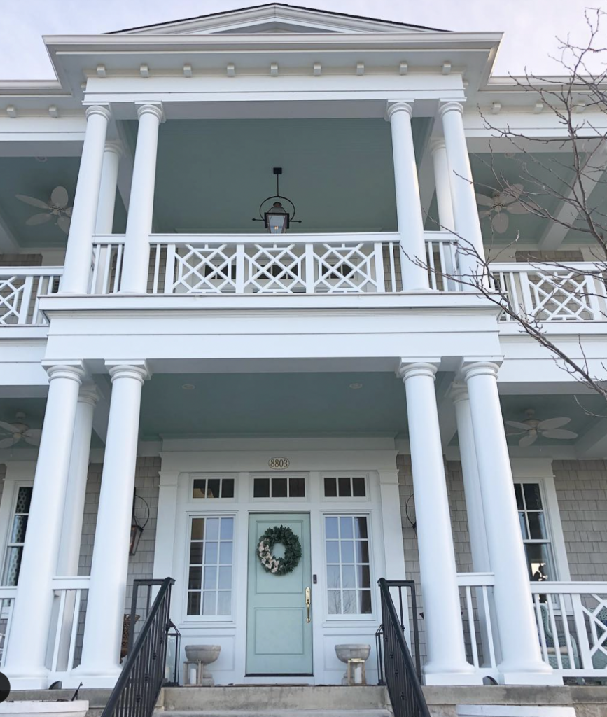 White Geometric Railing and Blue Door