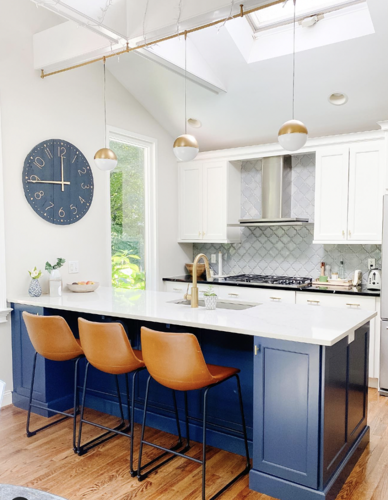 White Kitchen With a Blue Island