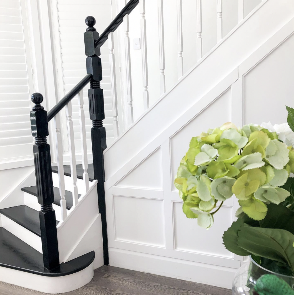 White Railings on a Black Staircase