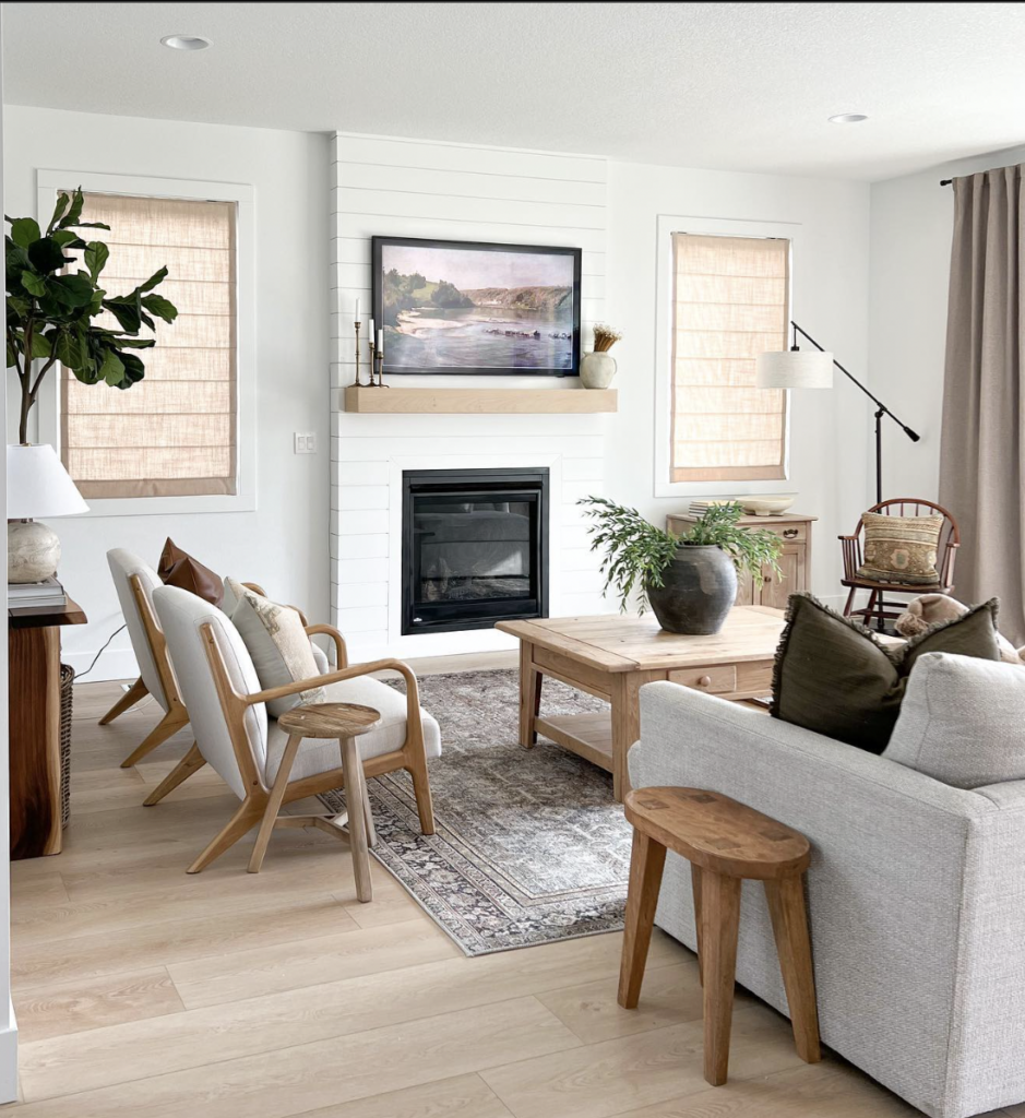 White Shiplap Wall with Black Fireplace