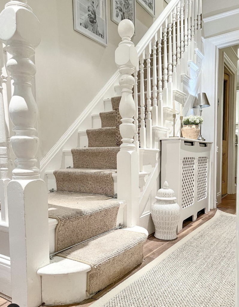 White Skirt Board on the Stairs and Beige Carpet Runner