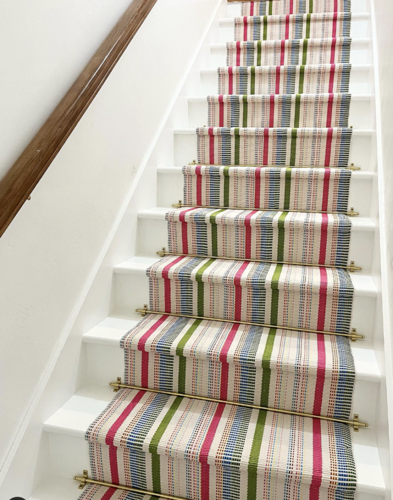 White Stairs with a Colorful Carpet Runner