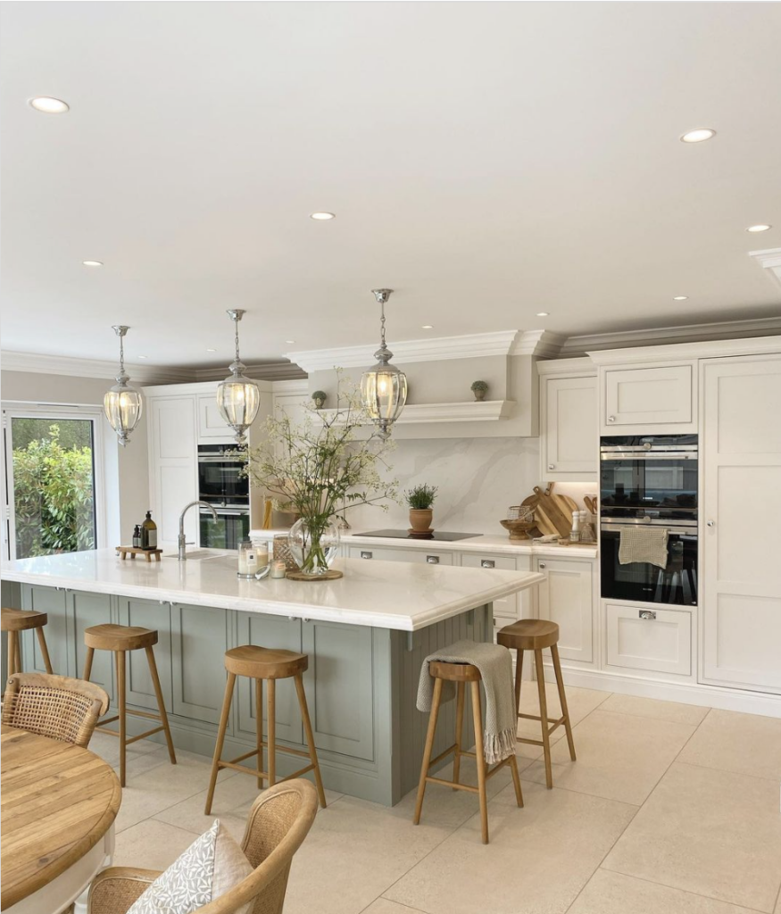 Kitchen With Beige Tile Flooring And White Trimming