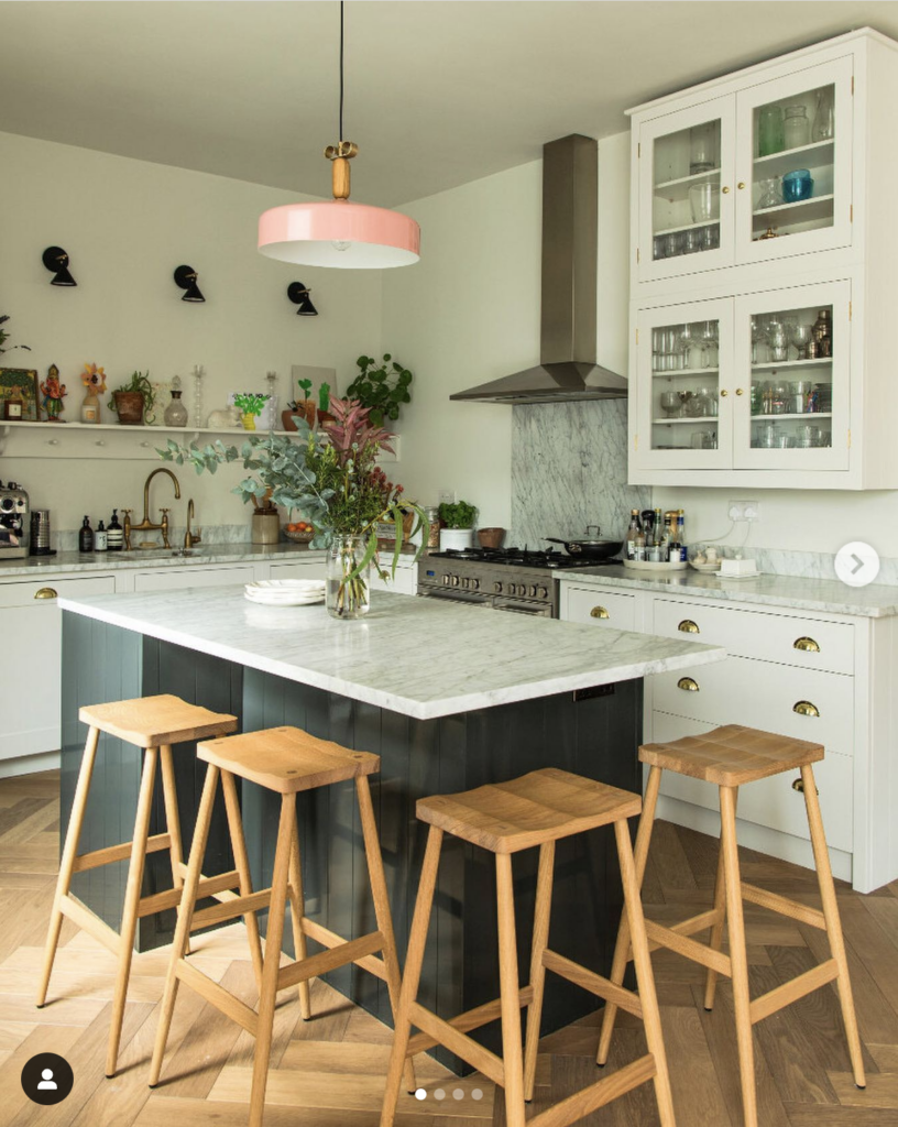 Wood Accents in a Kitchen with Glass Cabinetry