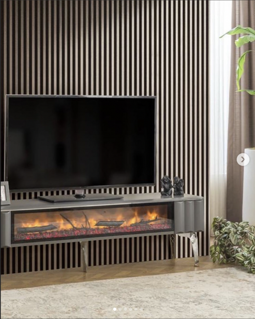 Wooden panelling electric fireplace wall with TV mounted above
