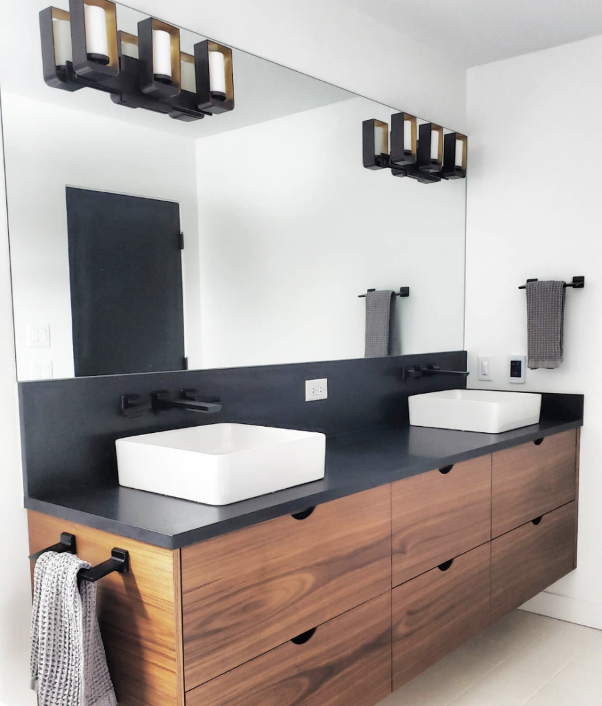 Wood Vanity with a White Sink