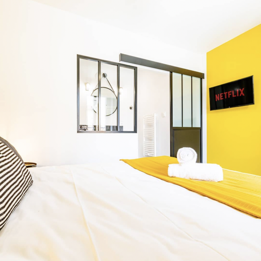 Yellow Bedroom Accent Wall and TV